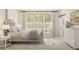 Cozy main bedroom with natural light, comfortable furnishings, and stylish decor creates a relaxing retreat at 7976 W Griswold Rd, Peoria, AZ 85345