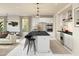Open-concept kitchen features a large island with barstool seating, ideal for entertaining guests at 7994 W Griswold Rd, Peoria, AZ 85345