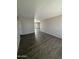 Inviting living room showcasing sleek flooring and fresh, neutral paint at 808 N 67Th Ln, Phoenix, AZ 85043