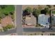 Aerial view of a property showcasing the roof, patio, and surrounding streets in a residential neighborhood at 9059 N Arroya Grande Dr, Phoenix, AZ 85028