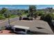 Scenic aerial view of a well-maintained home with a desert landscape and mountain views in the background at 9059 N Arroya Grande Dr, Phoenix, AZ 85028
