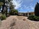 Backyard featuring desert landscaping and a walkway at 9059 N Arroya Grande Dr, Phoenix, AZ 85028