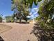 Large backyard featuring desert landscaping and a fence at 9059 N Arroya Grande Dr, Phoenix, AZ 85028