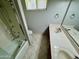 Bathroom featuring a double sink vanity and tiled shower at 9059 N Arroya Grande Dr, Phoenix, AZ 85028
