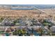 View shows a neighborhood with industrial buildings in the distance at 9654 E Pantera Ave, Mesa, AZ 85212
