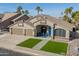 Inviting single-Gathering home features desert landscaping, and a blue front door at 9654 E Pantera Ave, Mesa, AZ 85212