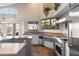 Gourmet kitchen with stainless appliances, ample counter space, and stylish cabinetry at 9654 E Pantera Ave, Mesa, AZ 85212