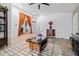 Spacious living room featuring tiled floors, bright lighting and modern decor at 9654 E Pantera Ave, Mesa, AZ 85212