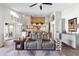 Bright and airy living room featuring stone accents, slate floors, and modern furnishings at 9654 E Pantera Ave, Mesa, AZ 85212