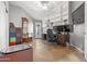 Well-lit home office space with built-in shelves and an executive desk at 9654 E Pantera Ave, Mesa, AZ 85212