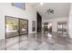 Large bright living area featuring high ceilings and multiple windows at 10056 E San Bernardo Dr, Scottsdale, AZ 85258