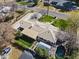 Aerial view of a home showcasing the expansive roof, backyard pool area, and a serene outdoor space with a firepit at 1018 W Kaler Dr, Phoenix, AZ 85021