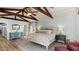 Light-filled main bedroom with vaulted ceiling and access to a private patio at 1018 W Kaler Dr, Phoenix, AZ 85021
