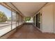 Relaxing, enclosed patio featuring a tile floor and large windows offering lots of natural light at 10405 W Sombrero Cir, Sun City, AZ 85373