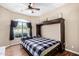 Bedroom featuring a bed that converts to a built-in cabinet at 10960 E Monte Ave # 257, Mesa, AZ 85209