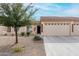 Charming single-story home with a low-maintenance desert landscape and spacious driveway at 10960 E Monte Ave # 257, Mesa, AZ 85209