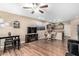 Spacious living area with an open layout, hardwood floors, and modern decor at 10960 E Monte Ave # 257, Mesa, AZ 85209