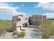 Striking modern home with a private gated entry and desert landscaping at 11097 Quinn Dr, Goodyear, AZ 85338