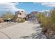 Modern home with beautiful desert landscaping and long driveway at 11097 Quinn Dr, Goodyear, AZ 85338