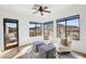 Bright sitting area featuring mountain views and a neutral color palette at 11097 Quinn Dr, Goodyear, AZ 85338