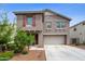 Charming two-story home featuring a two-car garage and well-maintained landscaping at 12018 W Taylor St, Avondale, AZ 85323
