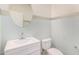 Powder room featuring new vanity and mirror at 12221 W Locust Ln, Avondale, AZ 85323