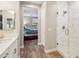 Bright bathroom boasts a walk-in shower with a glass door and modern tiling at 13218 W Crimson Ter, Peoria, AZ 85383
