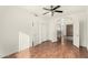A bright bedroom with hardwood floors and a large closet at 1478 E Spur Ave, Gilbert, AZ 85296