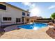 Stunning in-ground pool and beautiful backyard perfect for summer fun and relaxation at 1478 E Spur Ave, Gilbert, AZ 85296
