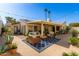 Inviting backyard patio with comfortable seating and charming string lights at 1500 N Markdale -- # 8, Mesa, AZ 85201