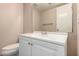 Bathroom featuring a white vanity and sink with a large mirror and toilet at 1500 N Markdale -- # 8, Mesa, AZ 85201