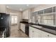 Kitchen featuring granite countertops, white cabinetry, and stainless steel appliances at 1500 N Markdale -- # 8, Mesa, AZ 85201