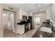 Kitchen featuring granite countertops, stainless steel appliances, and white cabinetry at 1500 N Markdale -- # 8, Mesa, AZ 85201