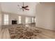 Inviting living room featuring a fireplace, wood-look flooring, and sliding glass doors at 1500 N Markdale -- # 8, Mesa, AZ 85201