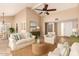 Bright living room with vaulted ceiling, neutral tones, and beachy accents throughout at 1500 N Markdale -- # 8, Mesa, AZ 85201