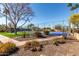 Enjoy beautifully landscaped tennis courts, perfect for recreation and exercise, surrounded by mature desert plants and trees at 1500 N Markdale -- # 8, Mesa, AZ 85201
