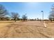 Enjoy a sand volleyball court for friendly games, surrounded by mature trees and landscaping in a well-maintained park setting at 1500 N Markdale -- # 8, Mesa, AZ 85201