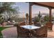 Inviting outdoor dining area with comfortable seating and desert views at 15123 E Monument Rd, Scottsdale, AZ 85262