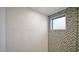 Modern bathroom with mosaic tile accent wall and window at 15221 N Clubgate Dr # 2094, Scottsdale, AZ 85254