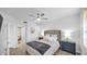 Comfortable bedroom with a ceiling fan, stylish furniture, and relaxing ambiance at 15221 N Clubgate Dr # 2094, Scottsdale, AZ 85254