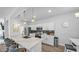 Modern kitchen featuring white cabinetry, stainless steel appliances, quartz countertops, and stylish pendant lighting at 15221 N Clubgate Dr # 2094, Scottsdale, AZ 85254