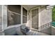 Private patio area with comfortable seating and door to inside at 15221 N Clubgate Dr # 2094, Scottsdale, AZ 85254