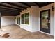 Covered back patio with multiple windows looking into the house at 16422 S 45Th Pl, Phoenix, AZ 85048