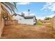 An image of a backyard featuring a yard, a house, and a privacy fence at 16422 S 45Th Pl, Phoenix, AZ 85048
