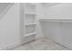 Walk in closet featuring shelving and rod for organization and storage at 16422 S 45Th Pl, Phoenix, AZ 85048