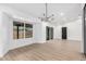 Bright living space boasting a slider door and expansive windows offering plentiful natural light at 16422 S 45Th Pl, Phoenix, AZ 85048