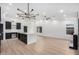 Open floor plan showcases an island kitchen featuring stylish countertops and modern light fixtures at 16422 S 45Th Pl, Phoenix, AZ 85048