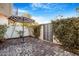 The backyard features a paved patio area, lush landscaping, and privacy fencing at 1717 E Morten Ave # 2, Phoenix, AZ 85020
