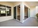 Balcony view to the townhomes with flowering vines and view to the bedroom at 1717 E Morten Ave # 2, Phoenix, AZ 85020