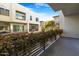 Spacious balcony area with metal railing featuring climbing green leafy ground cover at 1717 E Morten Ave # 2, Phoenix, AZ 85020